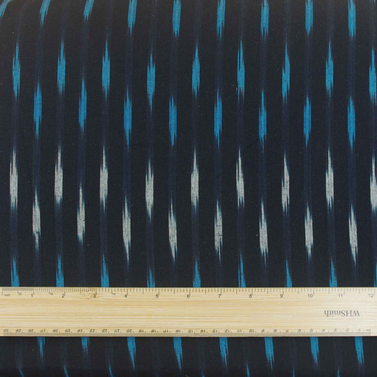 Ikat handgewebtes Baumwollgewebe-Design – schwarz mit gelb-weißen Webarten