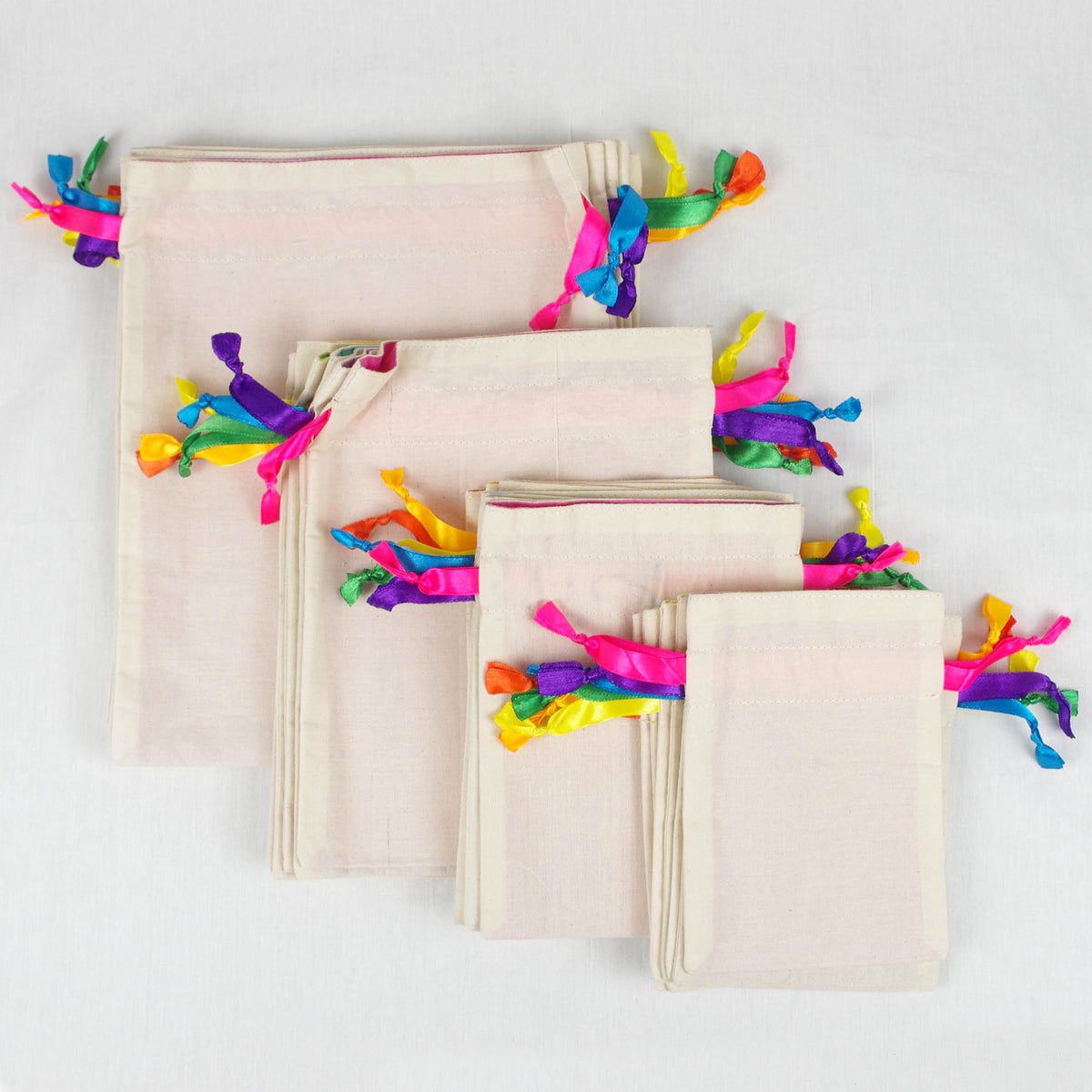 Cotton Drawstring Gift Bags In White Rainbow Colour X Set of 4