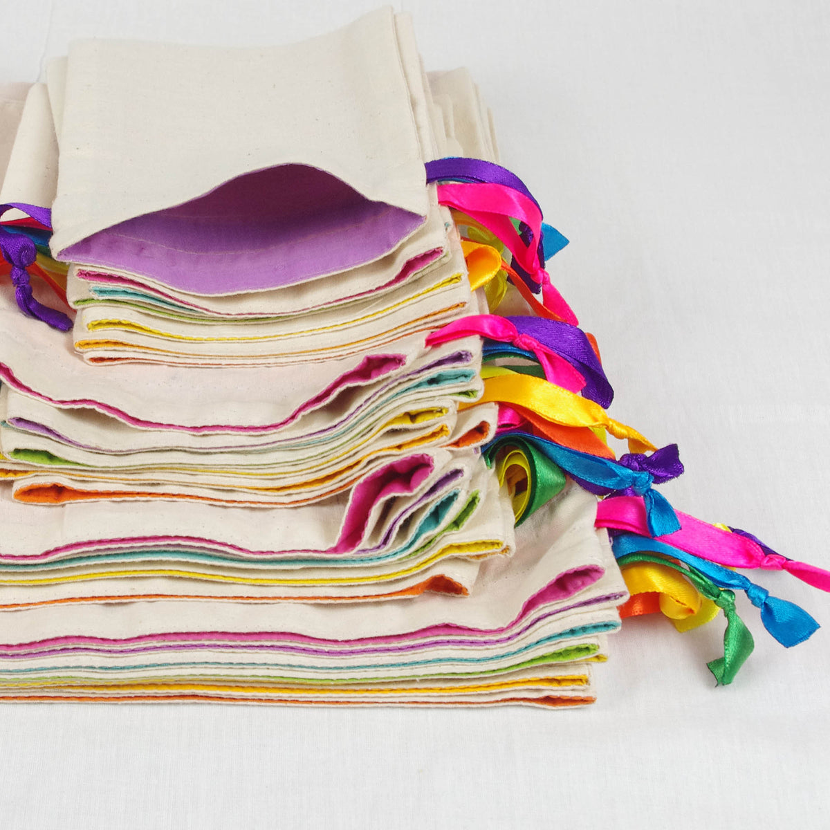 Cotton Drawstring Gift Bags In White Rainbow Colour X Set of 4