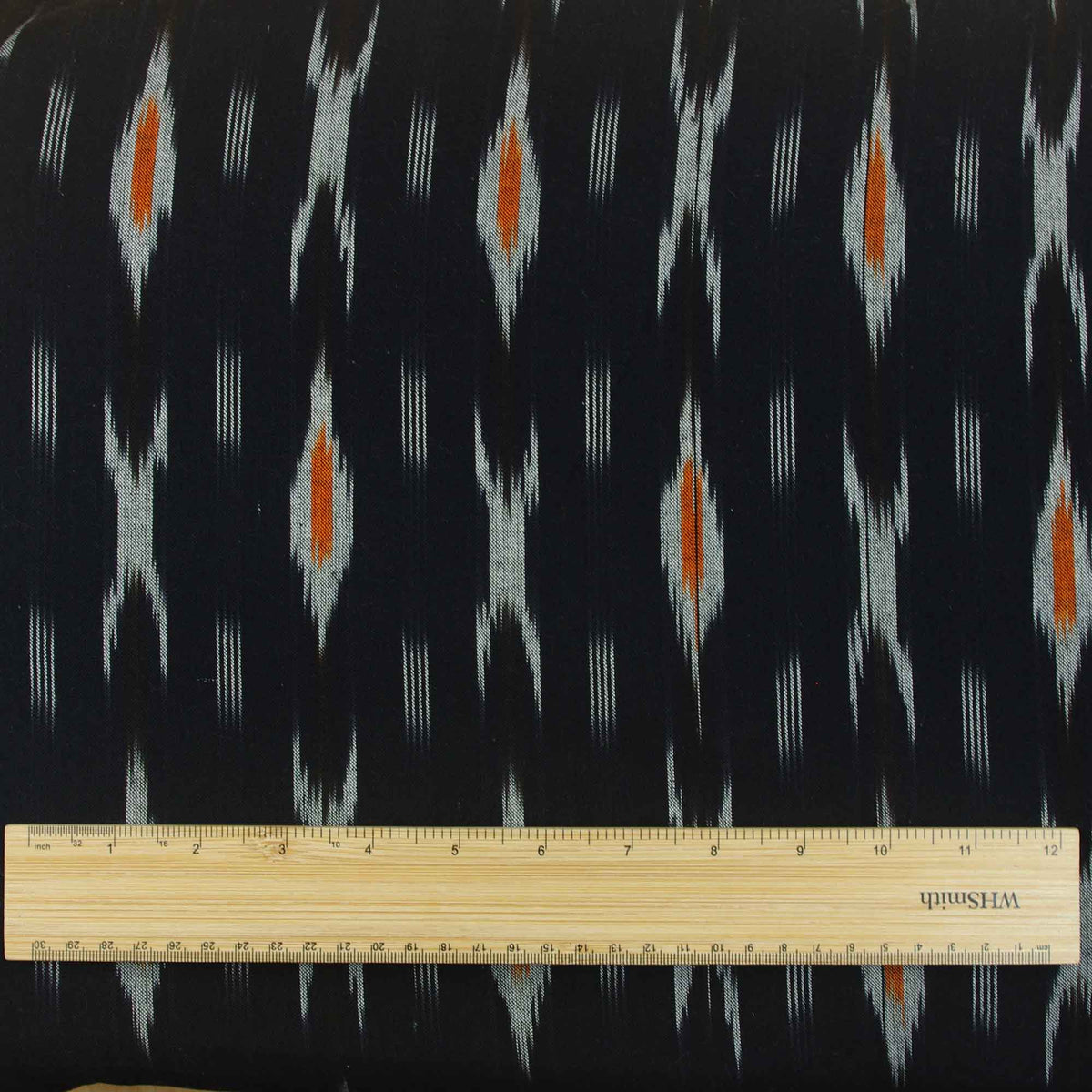 Ikat handgewebtes Baumwollgewebe-Design – schwarz mit gelb-weißen Webarten 