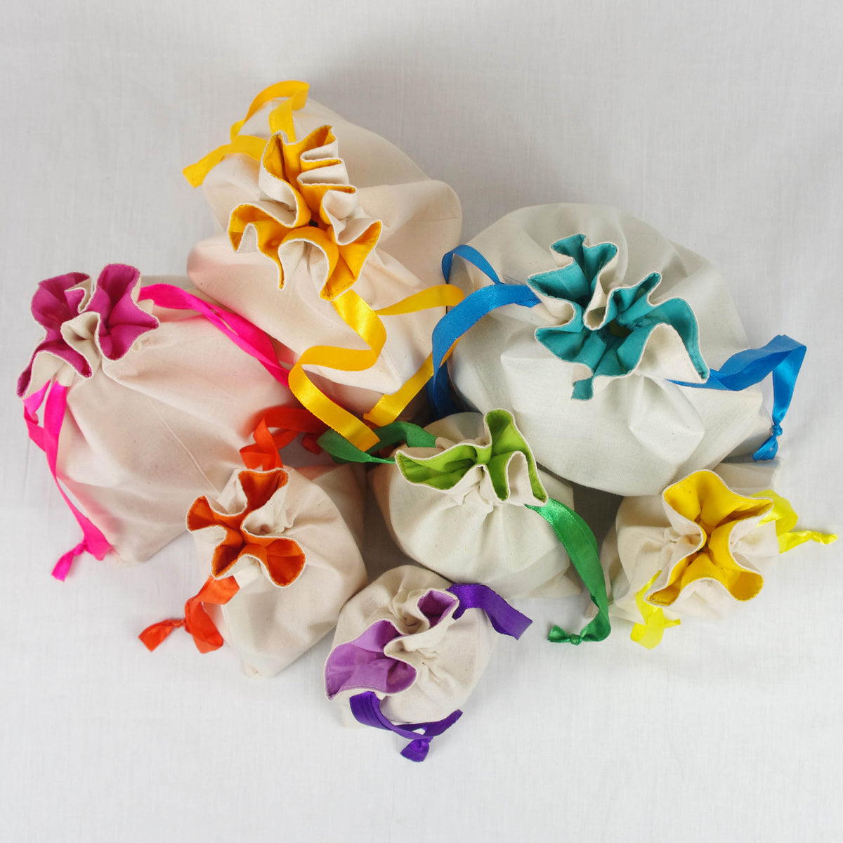 Cotton Drawstring Gift Bags In White Rainbow Colour X Set of 4