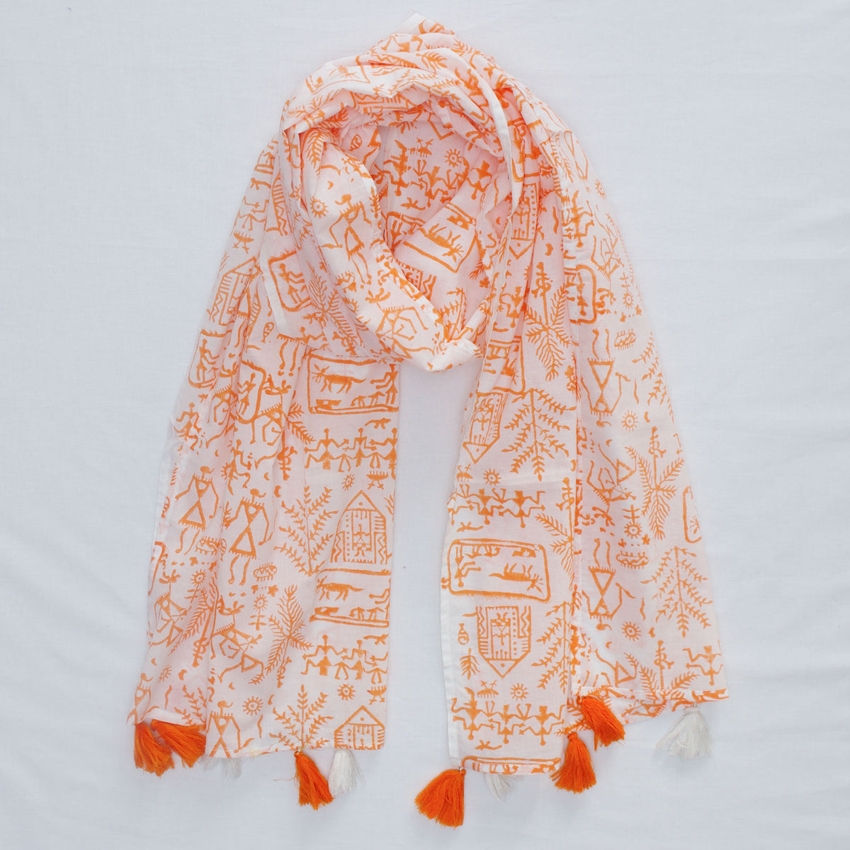 Cotton Scarf In White Light Orange Warli Print With Tussle